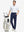 Front full body shot of model wearing dark blue stretch cotton blend slim fit golf trousers 5 pockets