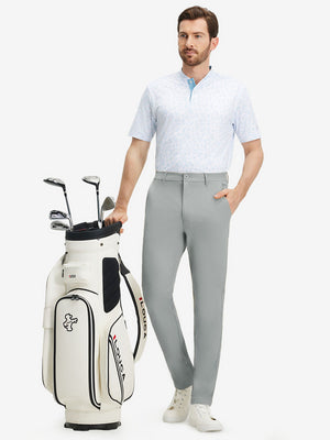 Front full body shot of model wearing rose dust stretch cotton blend slim fit golf trousers 5 pockets