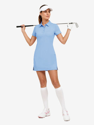 Front full body with golf club in light blue of women's lightweight golf dress with 2 pockets.