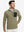 Model with one hand in side pocket, wearing midweight warm stretchy quarter zip pullover in desert yellow.