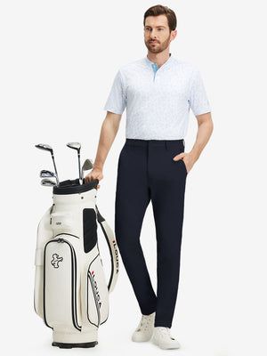 Front full body shot of model wearing navy stretch cotton blend slim fit golf trousers 5 pockets