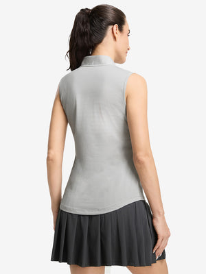 Back upper body shot of model wearing light grey white women's q-zip pin striped texture golf shirts