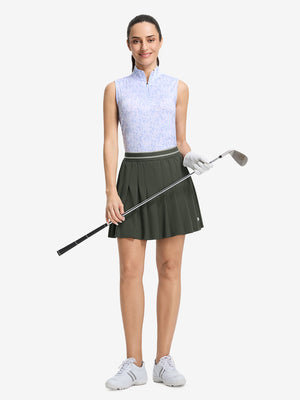 Front full body shot of model with golf gear wearing army green women's moisture-wicking athletic tennis skirts