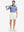 Front full body shot of model wearing white flat front flex cotton blend golf shorts