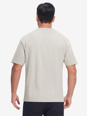 Back upper body view in light khaki heather of moisture wicking heather round neck athletic t-shirts.
