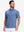 Front half body shot of model wearing light blue navy comfy breathable pin-stripe texture golf polos