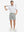 Front full body shot of model wearing rose dust flat front flex cotton blend golf shorts