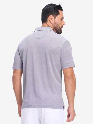 Back half body shot of model wearing light purple white comfy breathable pin-stripe texture golf polos