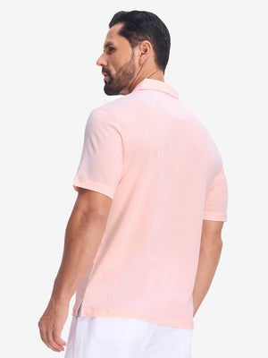Back half body shot of model wearing light pink white comfy breathable pin-stripe texture golf polos