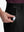 Detail view of front pocket on dark charcoal flat front hybrid golf shorts