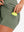Inner side pocket display in mossy stone of women's lightweight golf dress with 2 pockets.