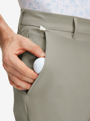 Detail view of side pocket on khaki grey stretch cotton blend slim fit golf trousers 5 pockets