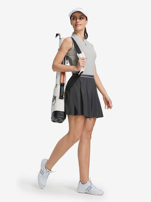 Front full body shot of model exercising in light grey white women's q-zip pin striped texture golf shirts