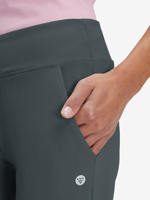 Side view of pocket on dark grey women's high waist stretch golf pants with pockets