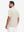 Back upper body view in light khaki heather of performance heather contrast collar polo shirts.