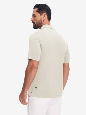 Back upper body view in light khaki heather of performance heather contrast collar polo shirts.