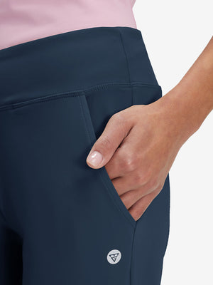 Side view of pocket on navy women's high waist stretch golf pants with pockets