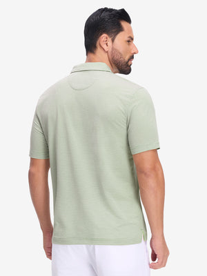 Back half body shot of model wearing moss green white comfy breathable pin-stripe texture golf polos