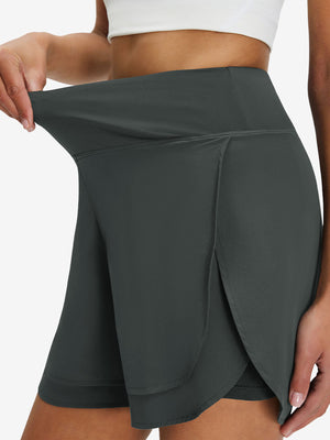 Detail view of elastic waistband on dark grey women's gym golf shorts with liner pocket