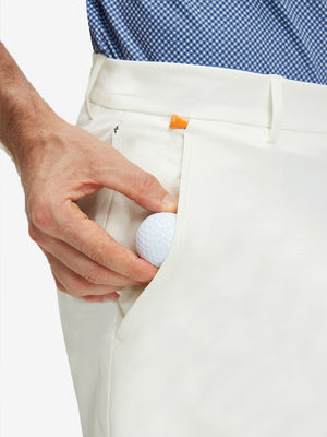 Detail view of front pocket on white flat front flex cotton blend golf shorts