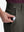 Detail view of front pocket on tea brown flat front hybrid golf shorts