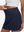 Detail view of elastic waistband on navy high waist built-in short a-line golf skirt with 5 pockets