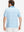 Back upper body shot of model wearing blue antichoke premium ribbed collar print polo shirts