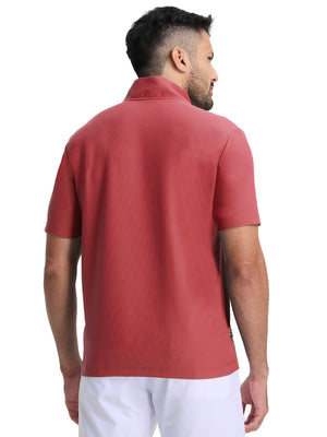 Back upper body shot of model wearing brick red waffle texture 1/4 zip pullover