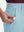Detail view of front pocket on light blue flat front hybrid golf shorts