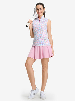Front full body shot of model exercising in colorful hearts women's sleeveless q-zip print quick dry golf tops