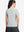 Back upper body shot of model wearing light grey women's 5 buttons collared polo shirts
