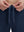 Close-up of elastic waistband on navy superion softness mesh joggers with zipper pockets