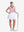 Front full body shot of model exercising in lavender women's collared v neck quick dry tank tops