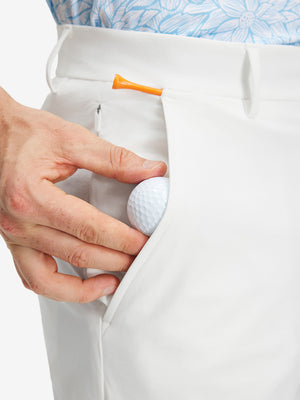Detail view of side pocket on white stretch cotton blend slim fit golf trousers 5 pockets