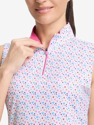 Detail view of neck zipper on colorful hearts  women's sleeveless q-zip print quick dry golf tops