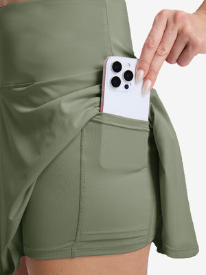 Detail view of inner pocket on mossy stone women's high waisted golf skirts with 4 inner pockets