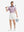 Front full body shot of model exercising in pink golf club premium ribbed collar print polo shirts