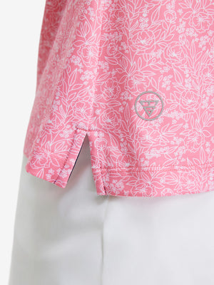 Detail view of hem on pink white florals women's sleeveless v-neck print golf shirts