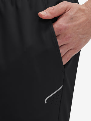Side view of pocket on black 4 way stretch breathable workout athletic shorts