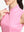 Detail view of neck zipper on pink white florals women's sleeveless q-zip print quick dry golf tops