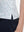 Detail view of hem on white blue florals women's sleeveless v-neck print golf shirts