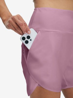 Side view of pocket on lavender pink women's high waist 2 in 1 quick dry shorts with 7 pockets