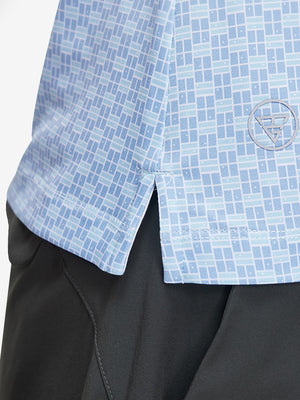 Detail view of hem on blue plaid women's sleeveless v-neck print golf shirts
