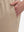 Side view of pocket on light khaki 4 way stretch breathable workout athletic shorts