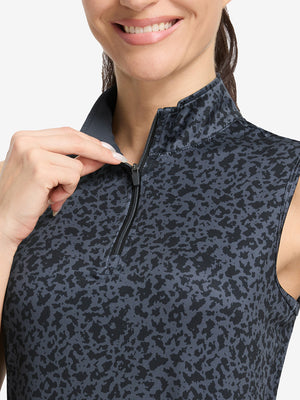 Detail view of neck zipper on black gray blocks women's sleeveless q-zip print quick dry golf tops