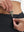 Detail view of inner pocket on black women's gym golf shorts with liner pocket