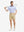 Front full body shot of model exercising in pink purple diamond premium ribbed collar print polo shirts