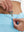 Detail view of elastic waistband on lake green women's gym golf shorts with liner pocket