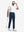 Front full body shot of model exercising in white waffle texture 1/4 zip pullover