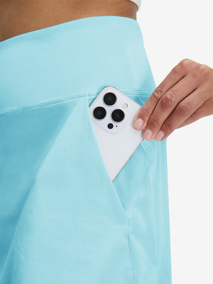 Detail view of side pocket on lake green women's stretch a-line golf skort with 7 pockets